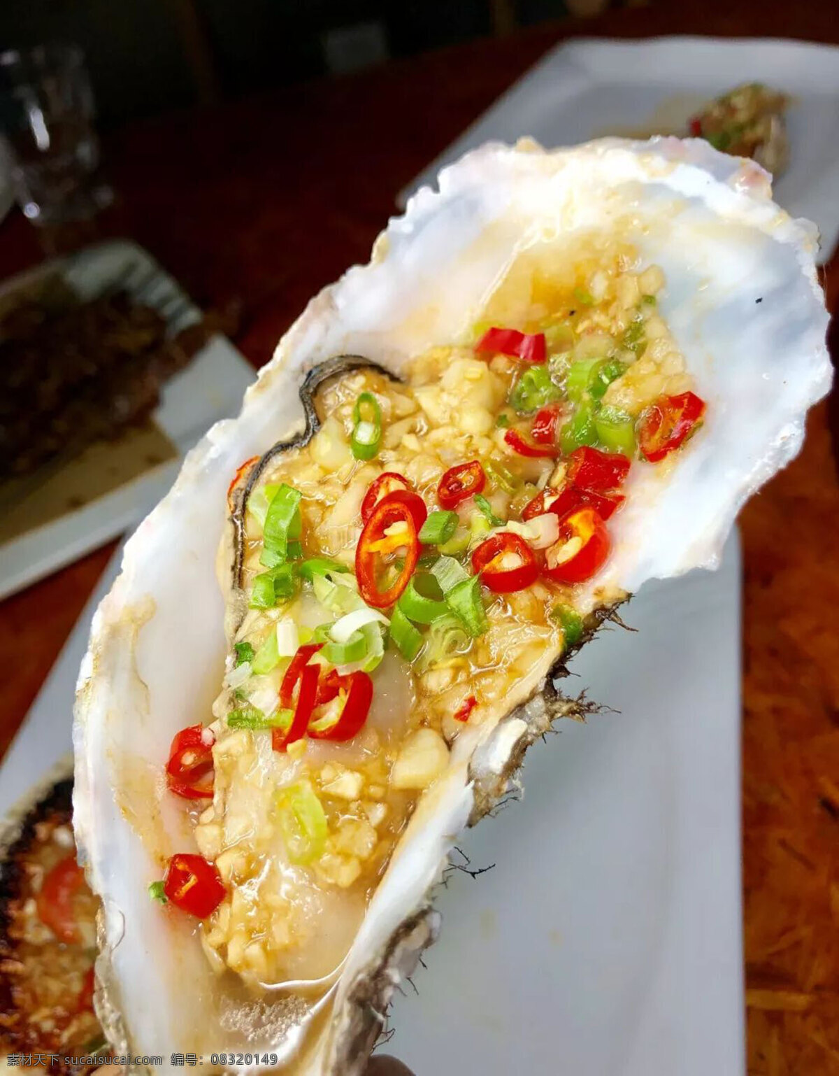 生蚝图片 生蚝 烧烤 味鲜 蒜香 香辣 餐饮美食 传统美食