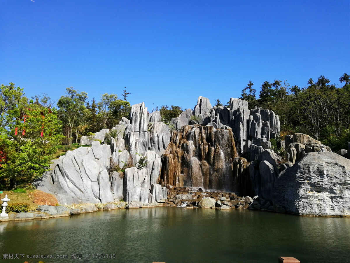 瀑布 石头 假山 蓝天 风景区 自然 树木 树 树林 风景 自然景观 建筑景观